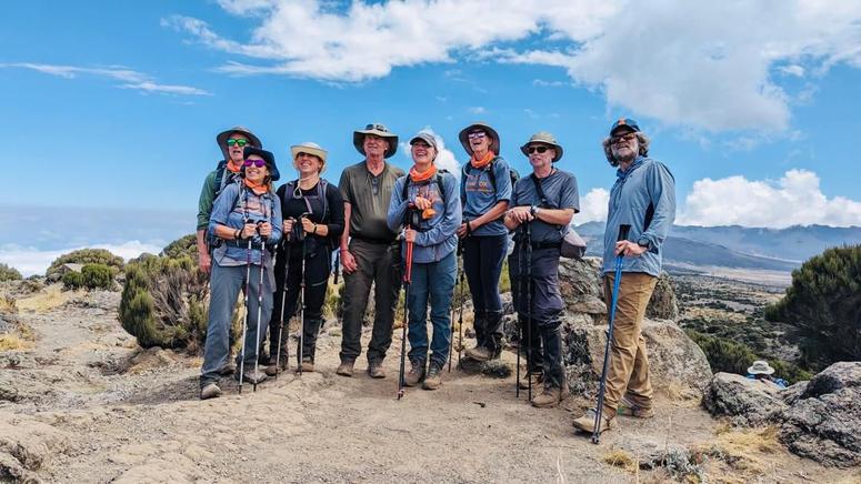 The whole team smiling on Mt. Kili