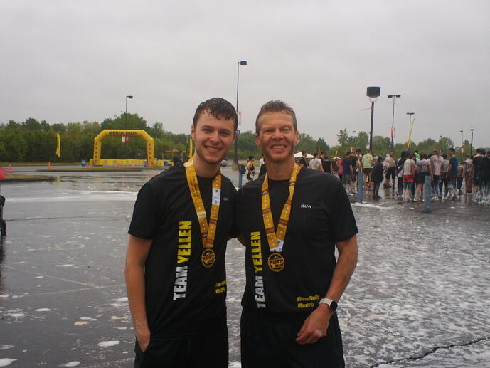 Steve Yellen at a mud run with his son, Matt