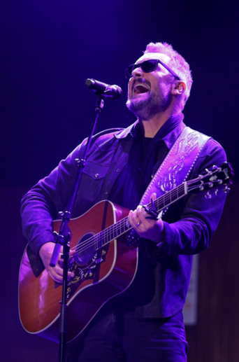 Eric Church performing on stage at the 2026 "A Country Thing Happened on the Way to Cure Parkinson's" fundraiser. 