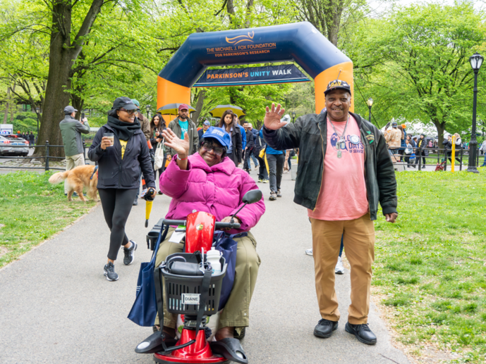 Participants cross the finish line at the 2026 Parkinson's Unity Walk. 