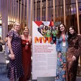 MJFF staff posing with a storyboard at MVP 2026.