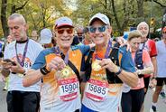 John with his 2025 NYC Marathon medal.