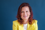 A woman smiling.