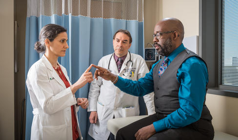 Doctor and patient in office.