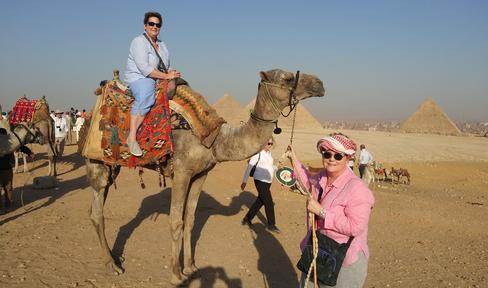 Mona Dewart on a camel