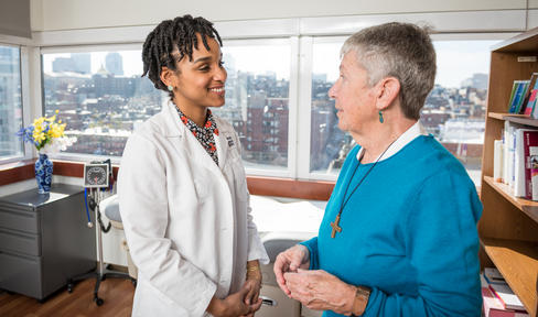 Health care professional and person in a room