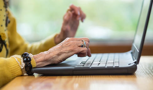 Patient using laptop