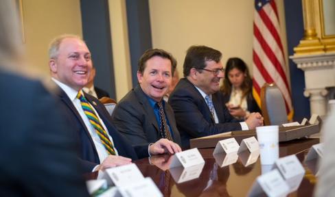 People sitting around table at Capitol Hill.