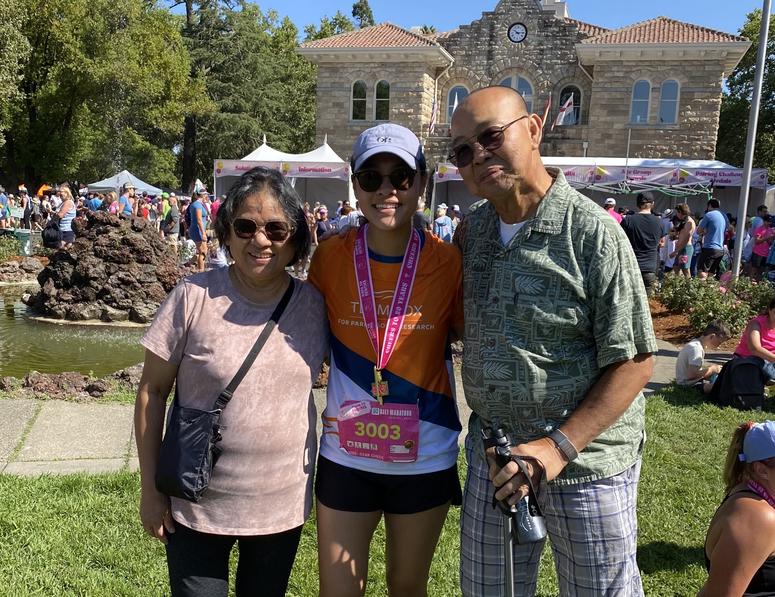 Hang and Hien supporting Athena at the 2024 Napa to Sonoma Half Marathon.