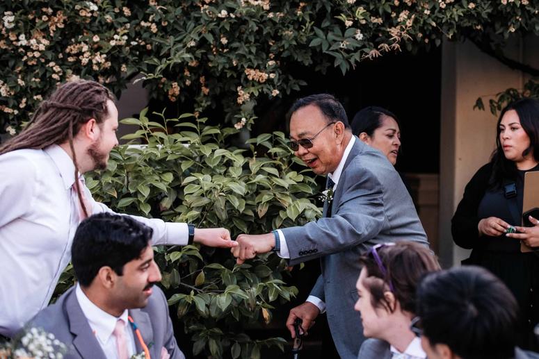 Hien is all smiles at Athena’s wedding.