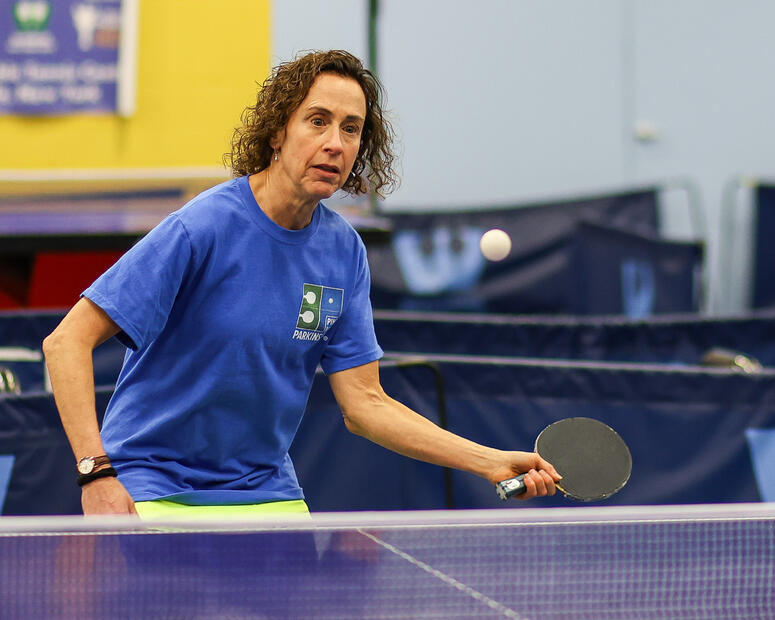 Margie Alley playing ping pong.