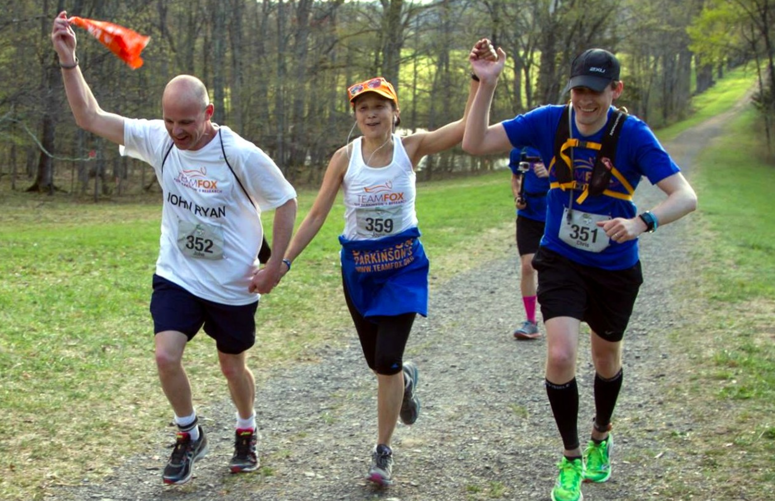 Joyce running with her teammates