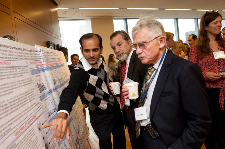 man looking at research