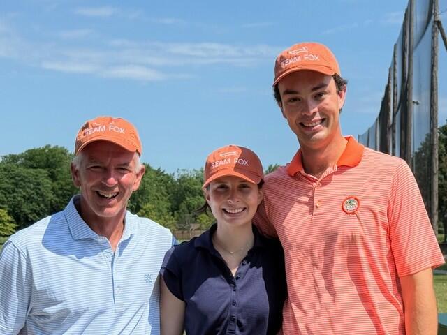 Mike DeBartolo (left) with his family at Play for Parkinson's.