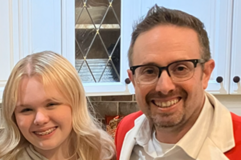 Bryan Roberts in a Santa "suit" with his daughter, Avery. 