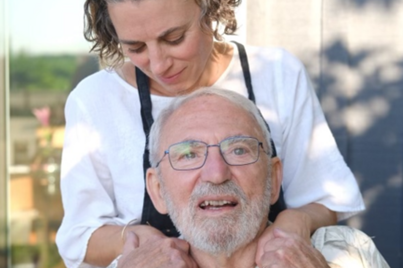 Aimie Vallat with her arms around her father, Gary Vallat.