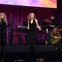 Stevie Nicks, Maggie Rogers and Michael J. Fox perform onstage. 