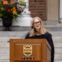 Debi Brooks delivers remarks at Dartmouth's Tuck School of Business