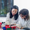 Two female researchers in the lab.
