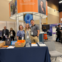 MJFF staff stand in front of the Foundation's booth at WPC.