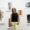 Torrance York posing with her work