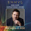 Promotional graphic for the Emmy’s Bob Hope Humanitarian Award featuring a portrait of Michael J. Fox on a blue background with light streaks.