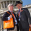 Two male advocates in front of the United States Capitol building at the Parkinson's Policy Forum.