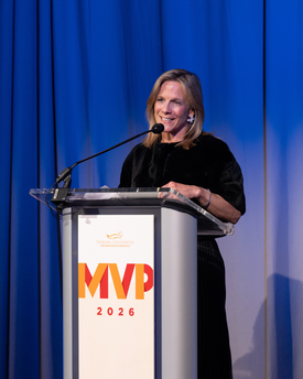 Lisa Boudreau at a podium that says MVP 2026