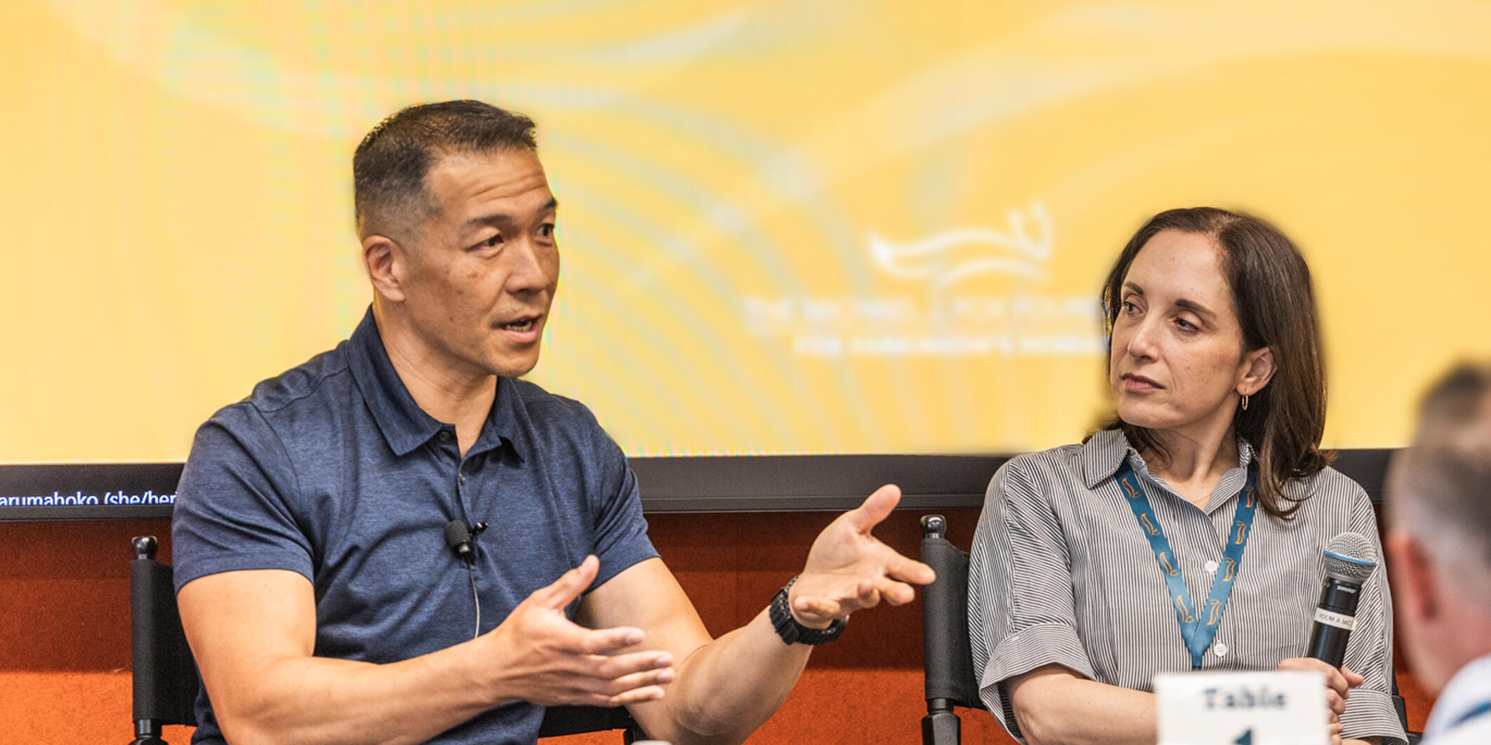 Jimmy Choi speaks at a panel event for Parkinson’s research